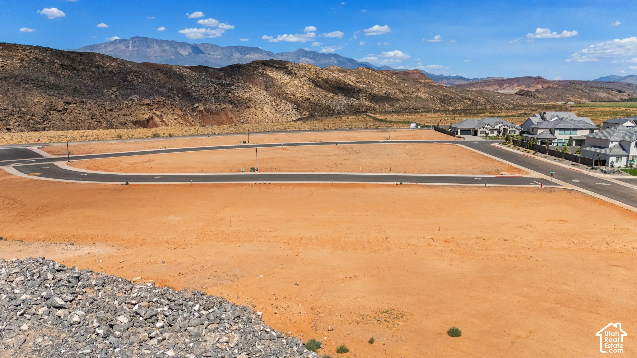Expansive undeveloped land parcels with paved road access