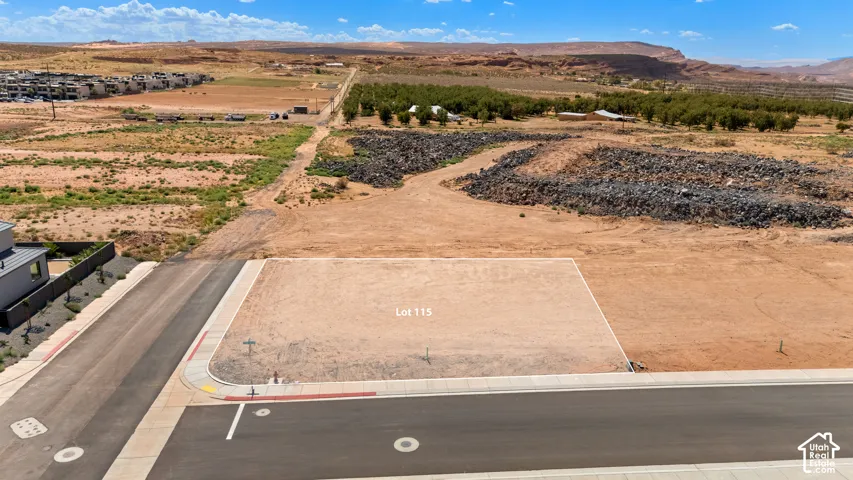 Developed lot featuring paved road access, curb, and gutter infrastructure