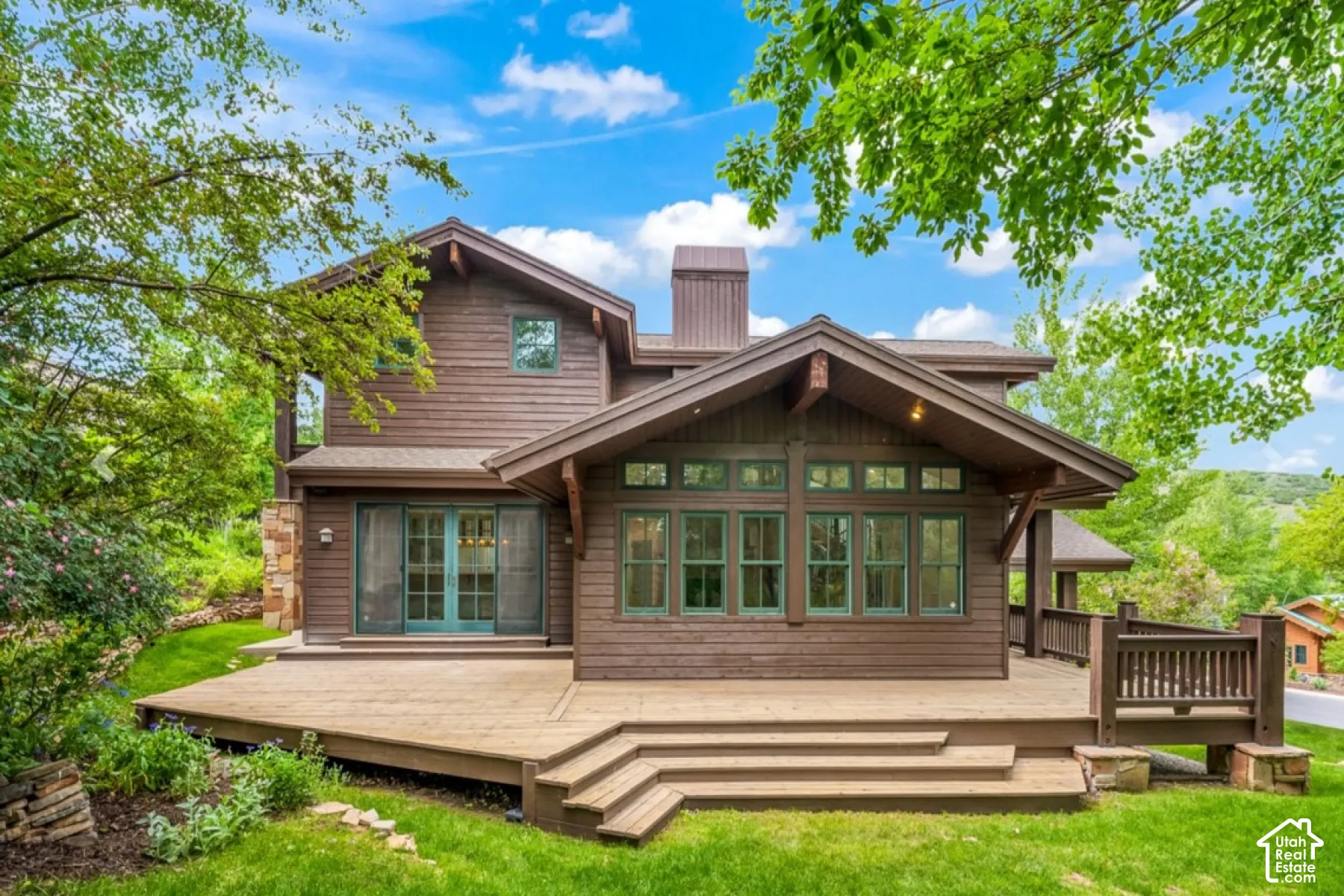 Expansive rear deck with multiple access points