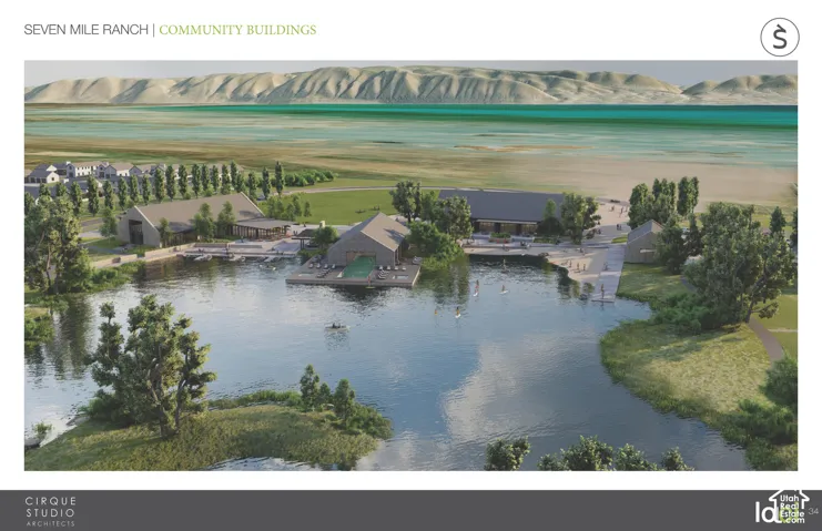 Lakefront community buildings with multiple docks, surrounded by landscaping and distant mountains