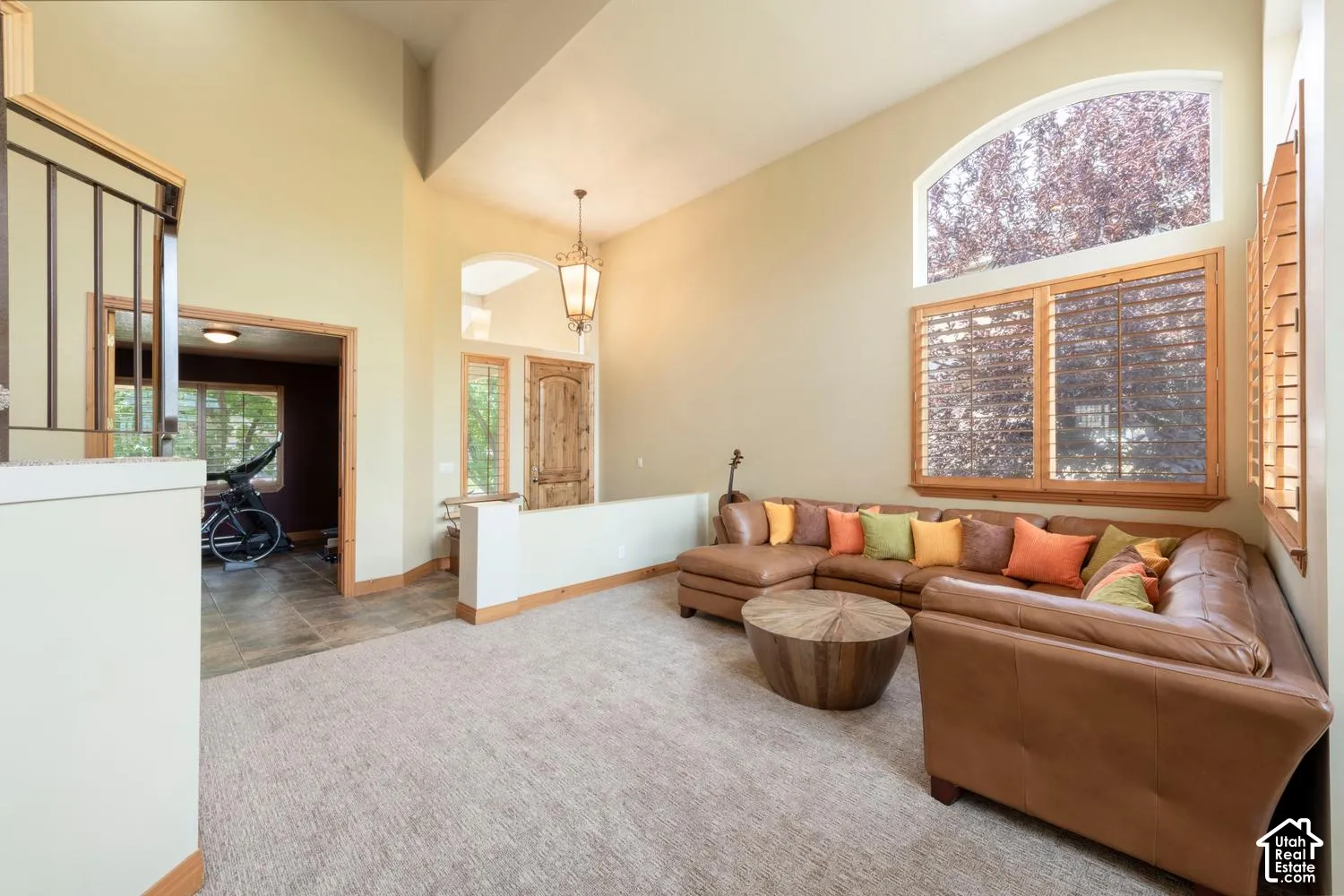 Vaulted ceilings with an arched transom window