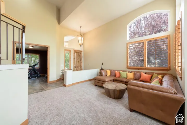 Vaulted ceilings with an arched transom window
