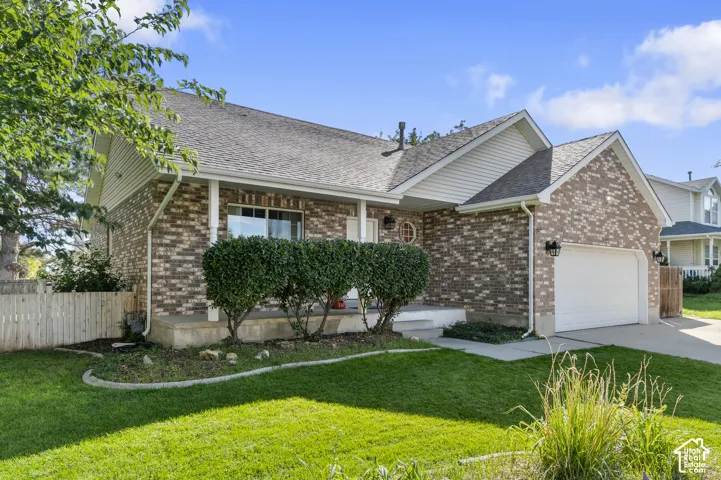 Brick exterior with white siding accents