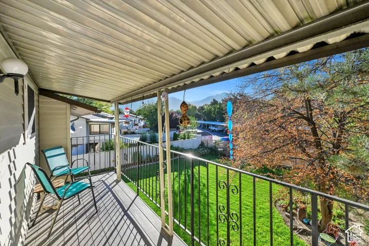 Covered balcony with mountain view