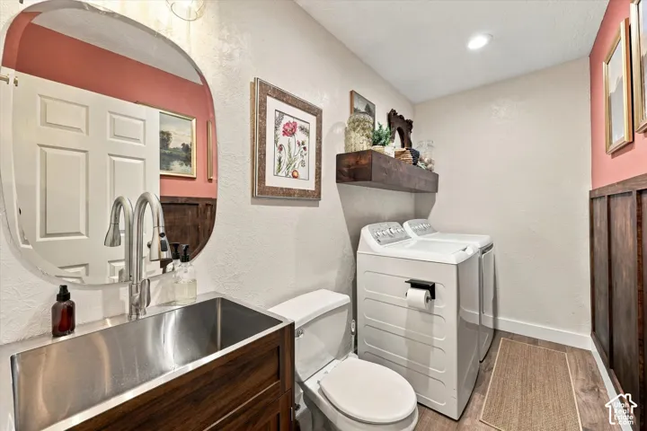 Stainless steel basin sink with a contemporary pull-down faucet