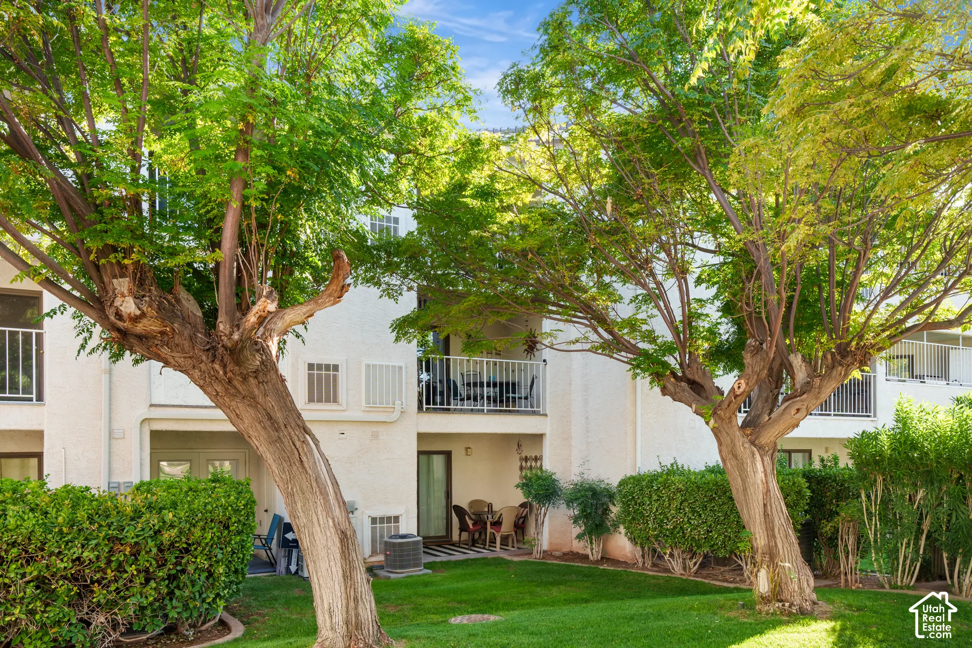 Viewed from Shuffle ballcourt. Second floor center balcony is this unit