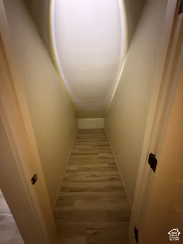 Recessed storage area with wood-finish flooring