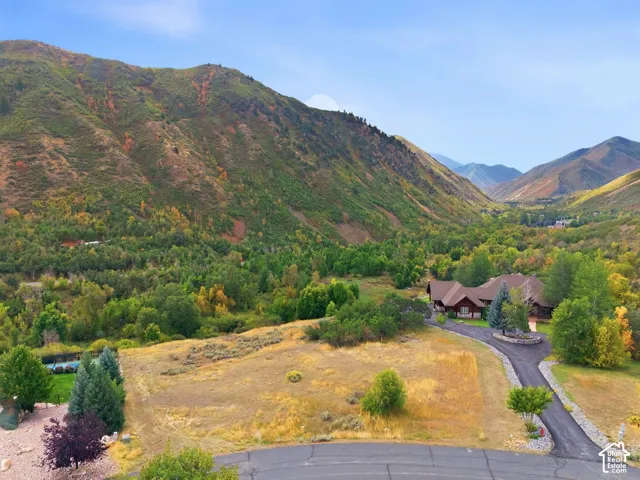 Mountain valley setting with views of distant peaks