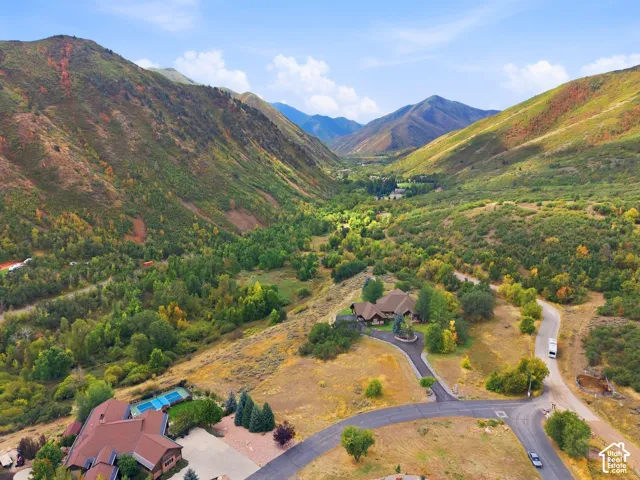 Expansive mountain valley setting featuring natural landscaping