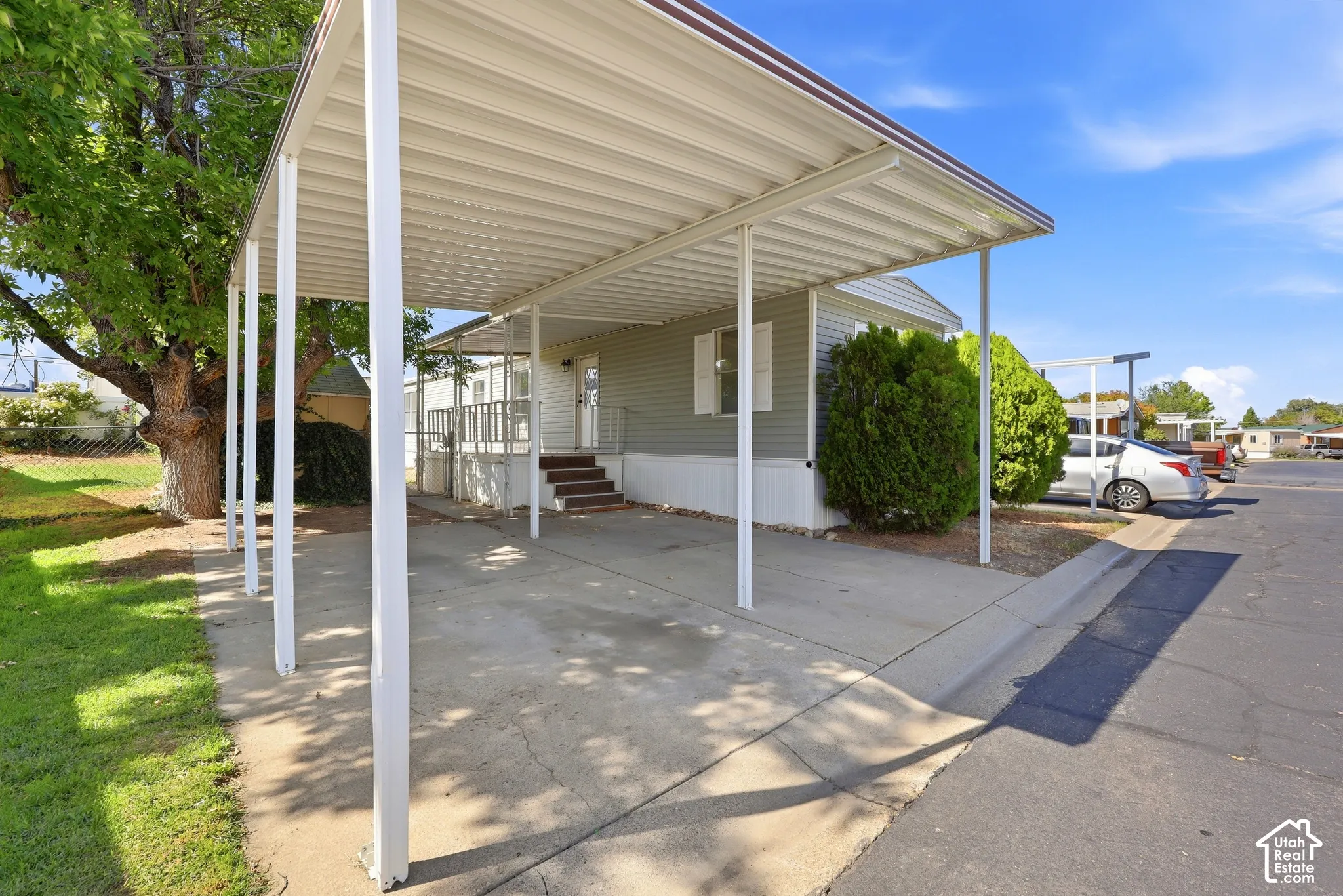 Attached carport with a metal roof