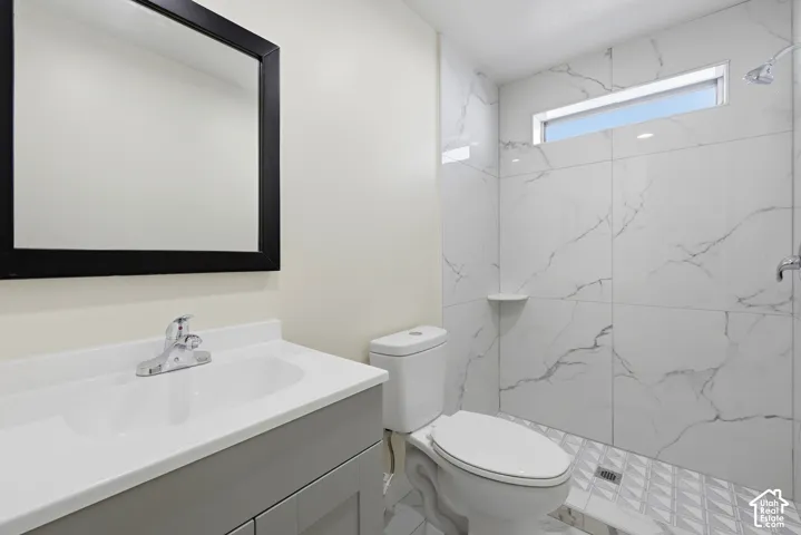 Vanity with an integrated sink and chrome faucet
