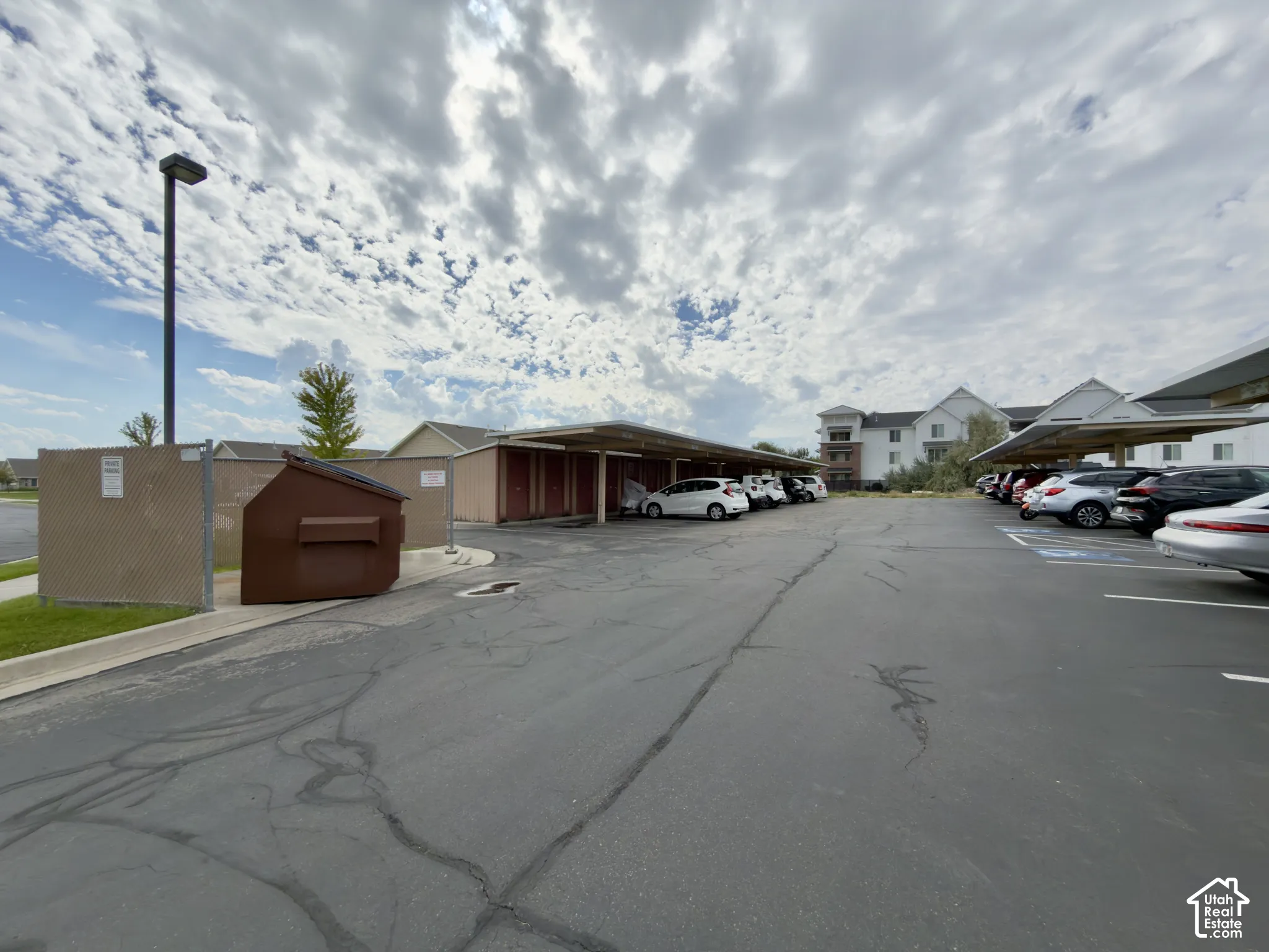 Parking lot & community garbage dumpster