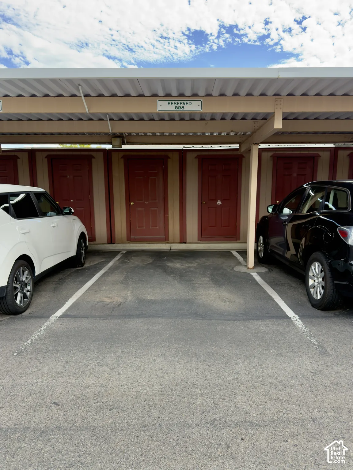 Reserved covered parking space with paved asphalt & Storage closet at the back of your covered parking space