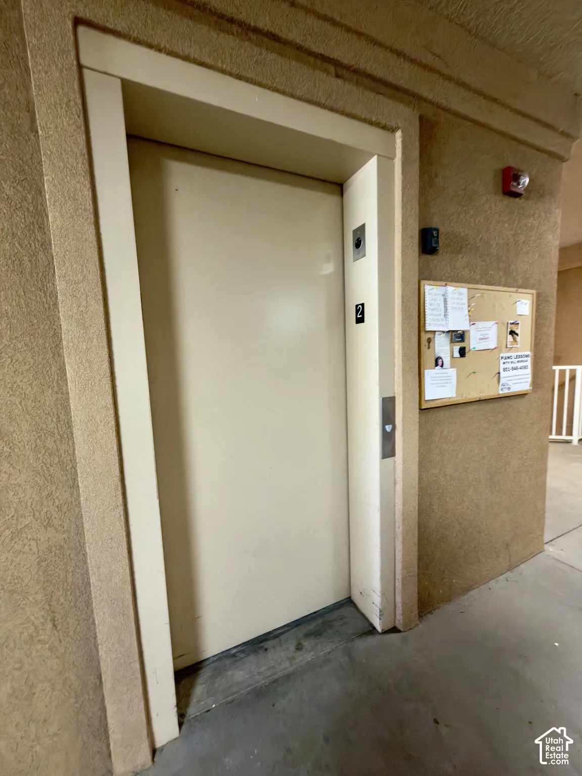 Elevator on the top floor just around the corner from the front door