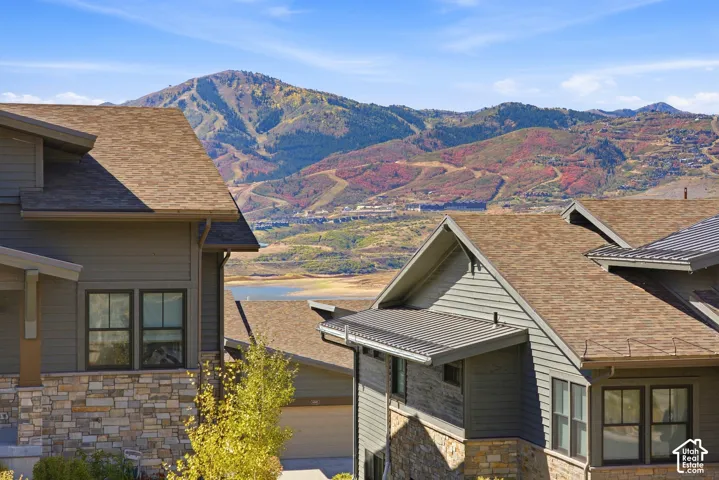 Stone and siding exterior with gabled roof lines