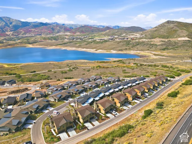 Residential development with mountain and water backdrops