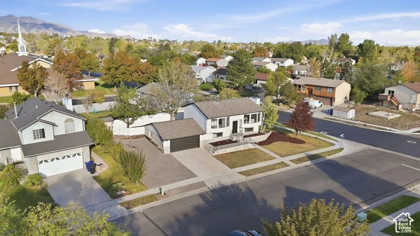Single-story residence with a two-car garage and a paved driveway