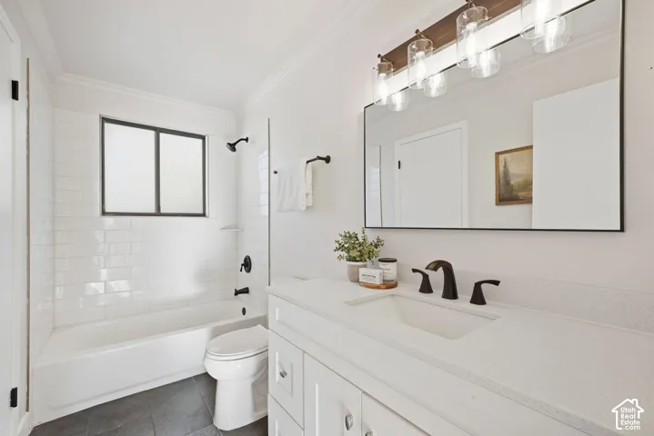White subway tile shower surround with a built-in tub