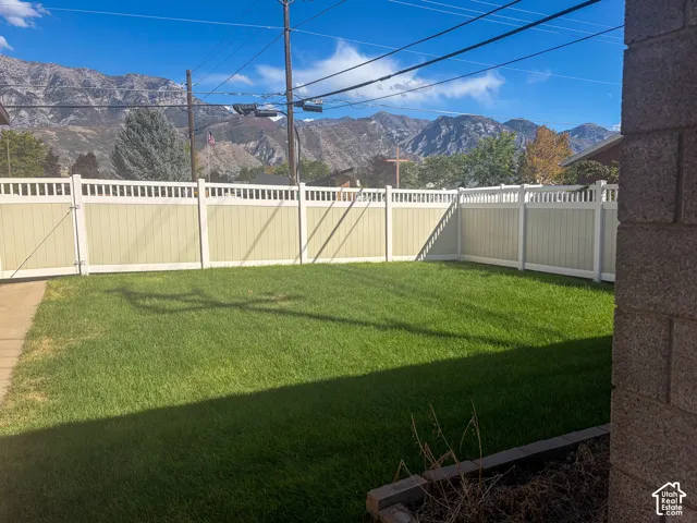 Private side yard with access to garden area and shed