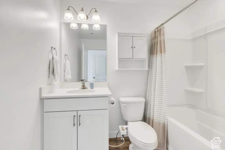 Vanity with an integrated sink and base cabinetry