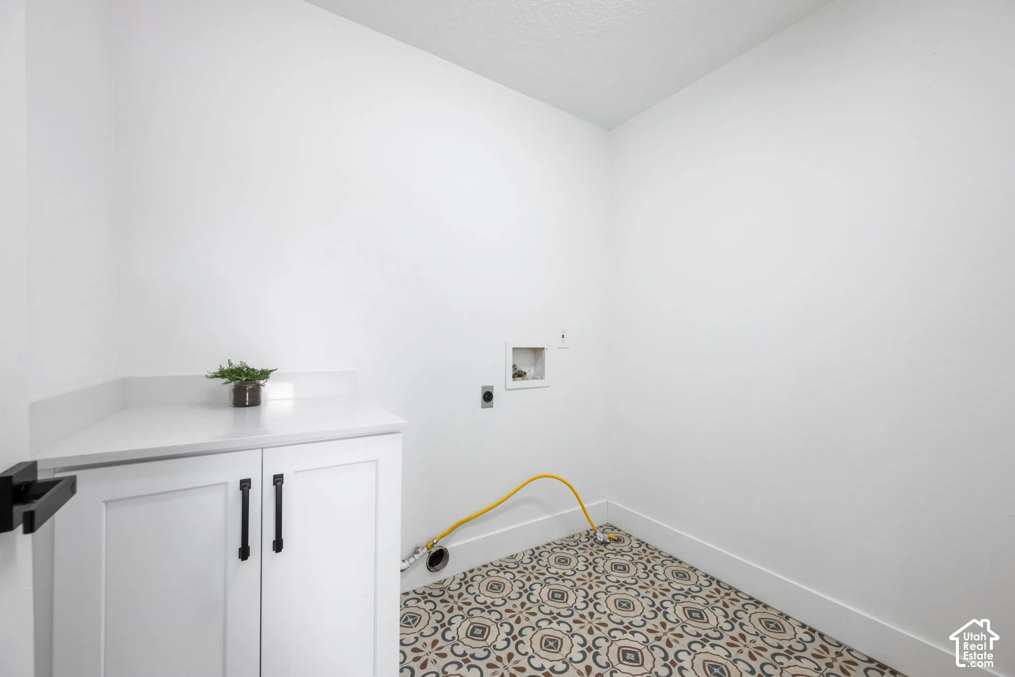 Built-in cabinetry with a white countertop