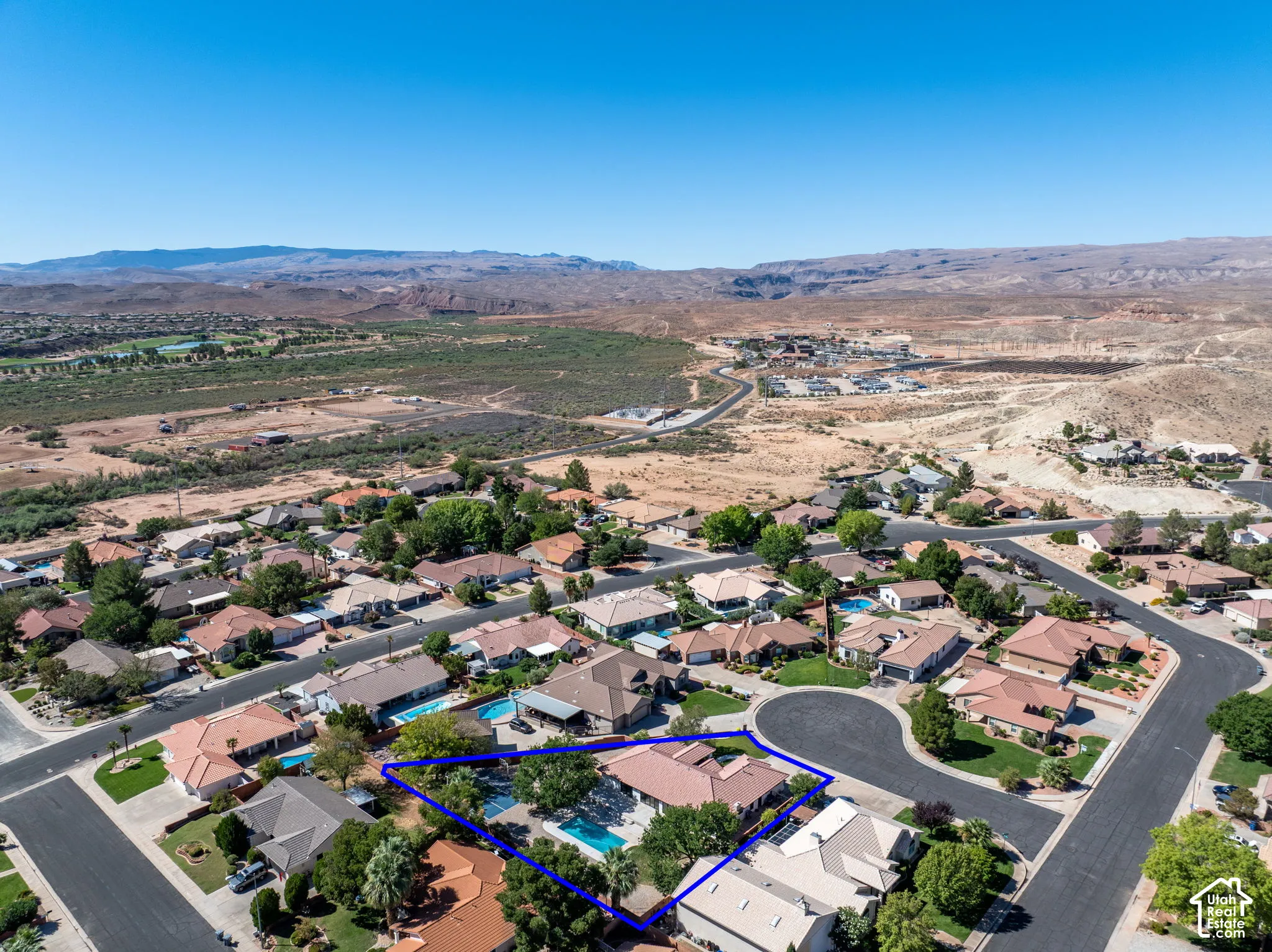 Residential neighborhood with desert and mountain backdrop