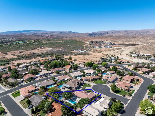 Residential neighborhood with desert and mountain backdrop