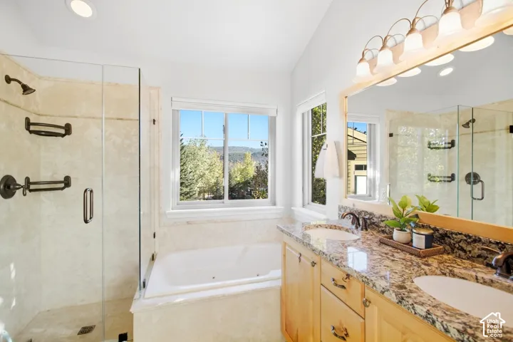 Double vanity with undermount sinks and granite countertops