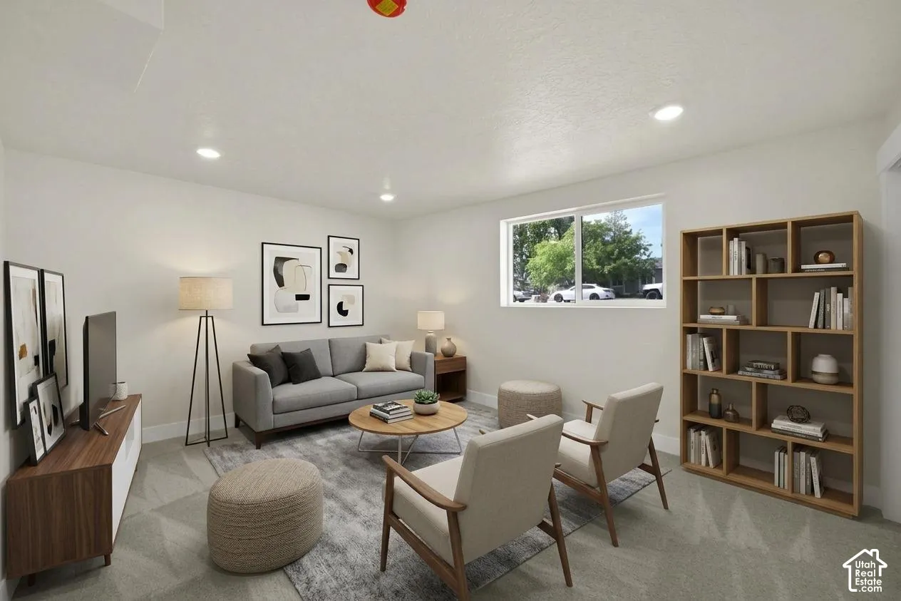 Recessed lighting, wood-finish shelving, and a large window providing natural light