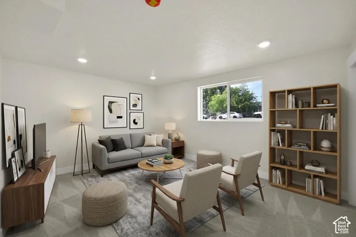 Recessed lighting, wood-finish shelving, and a large window providing natural light