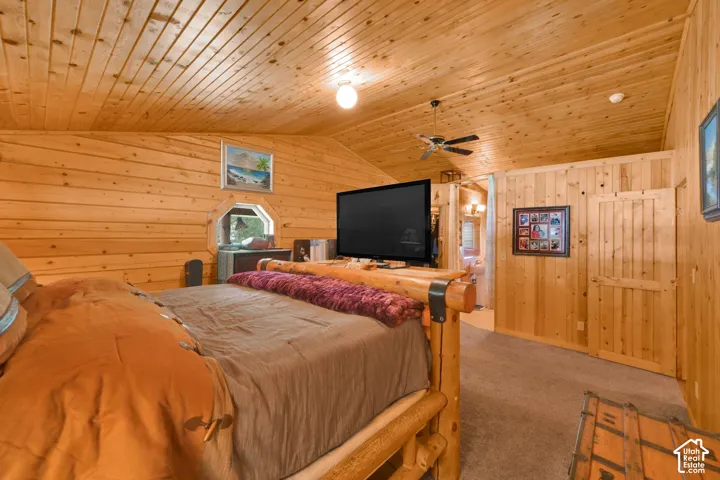 Primary bedroom with bathroom attached, gorgeous wood.