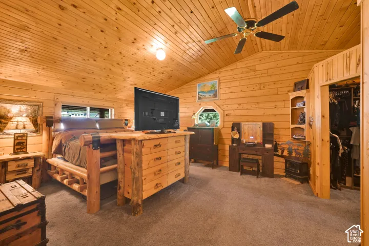 Primary bedroom with bathroom attached, gorgeous wood.