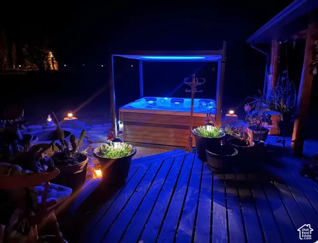 Outdoor Bull Frog spa with an integrated canopy