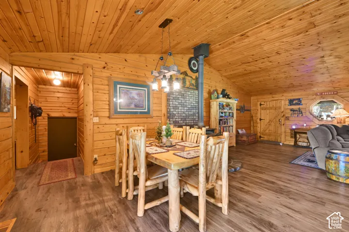 Wood burning stove in dining area off of living room.