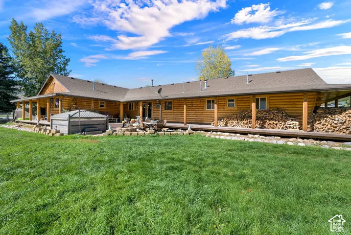 Exterior of cabin home with bull frog spa included