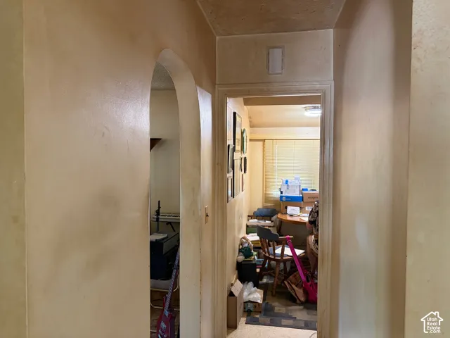 Archway entry leading to an interior space