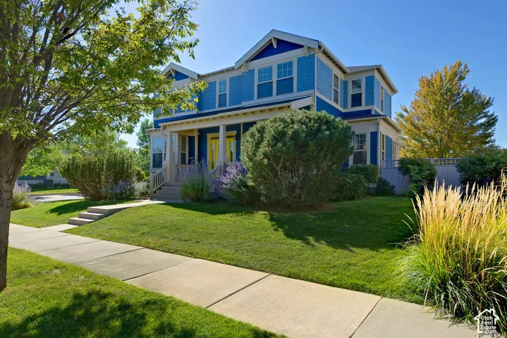 Two-story residence with blue siding and white trim