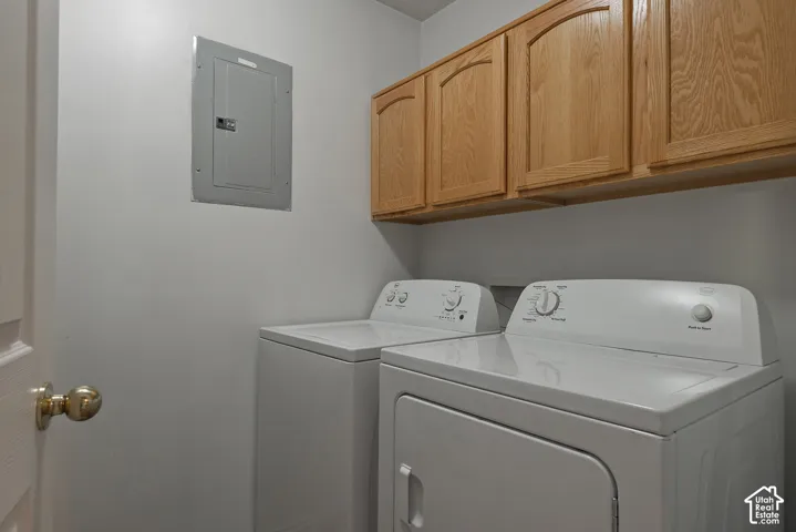 Built-in wood-finish cabinetry provides storage