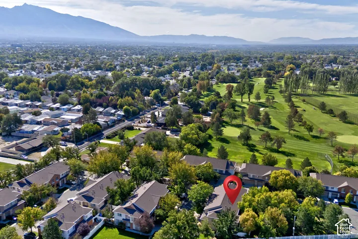 Expansive golf course frontage with mountain backdrop