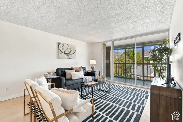 Living area with light-toned flooring and white walls