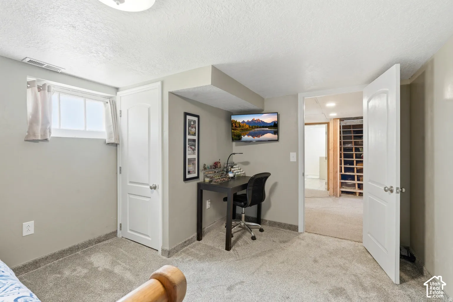 Soft gray carpeting throughout