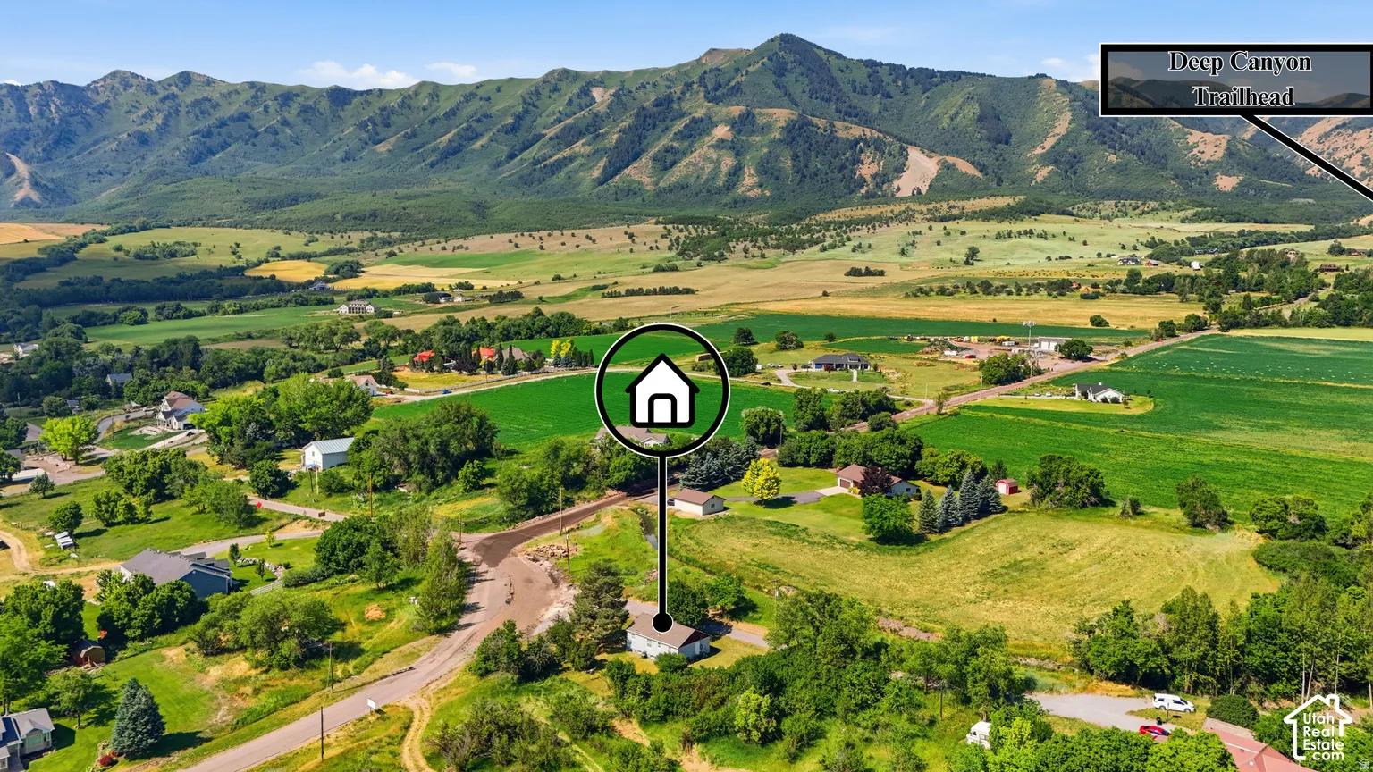 Expansive rural landscape with prominent mountain backdrop