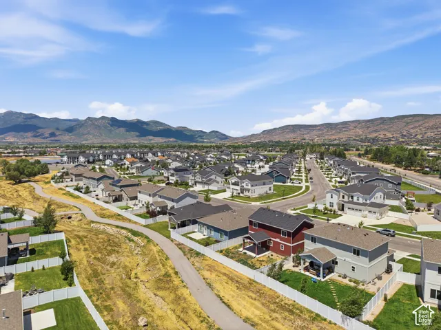 Residential community featuring varied architectural styles and mountain backdrops