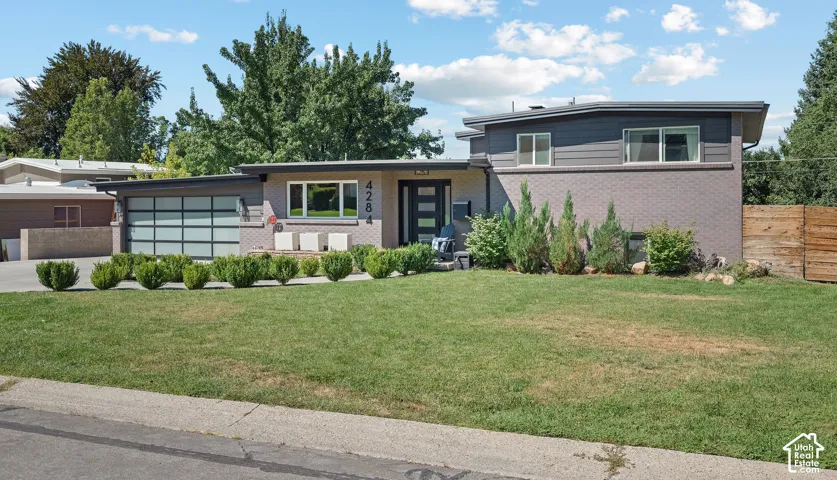 Modern exterior with brick and horizontal siding