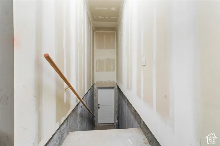 Basement entrance through the garage.