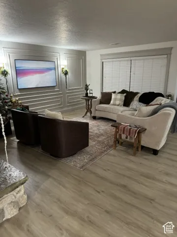 Wood-finish flooring throughout the space