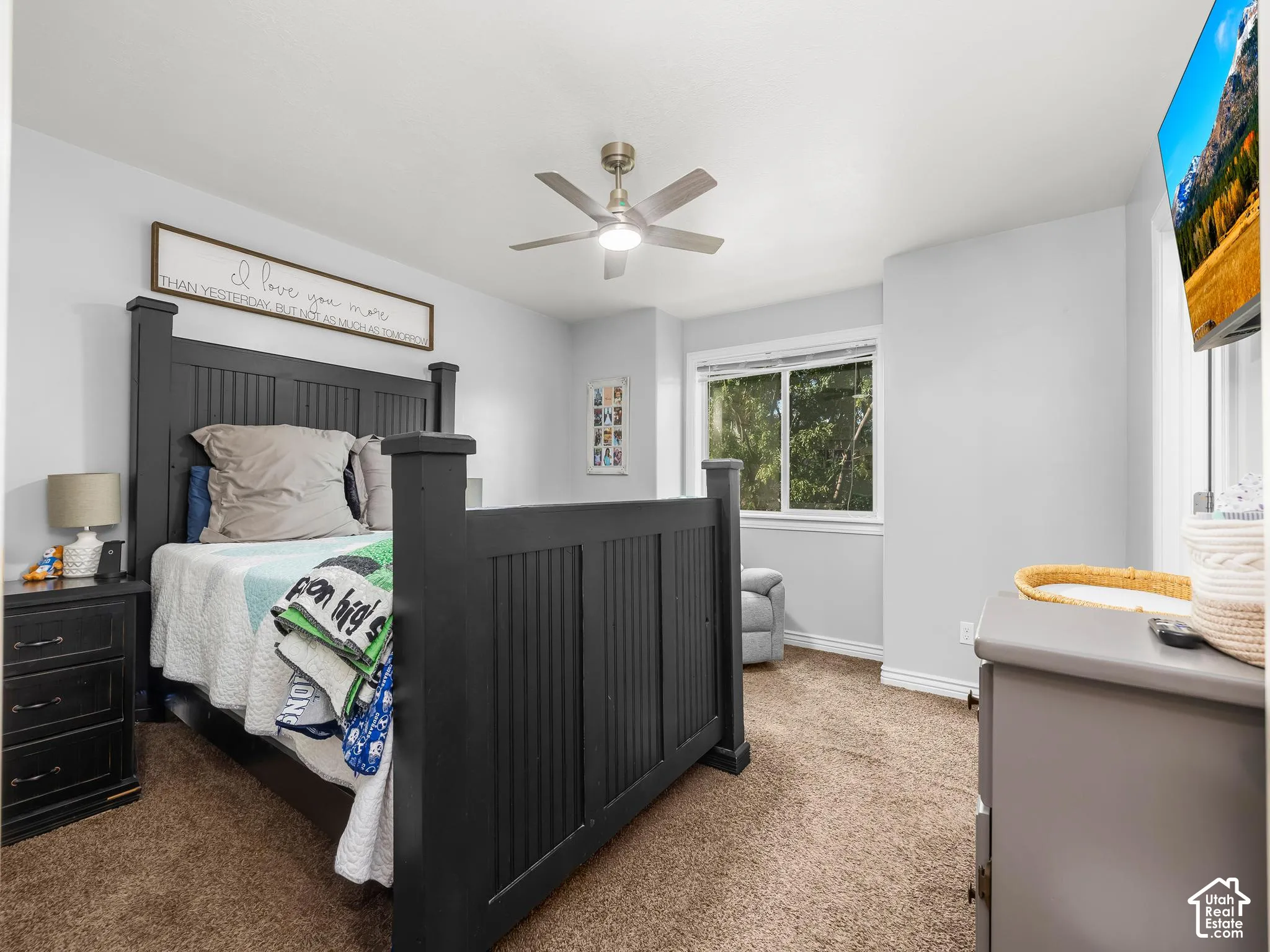 Neutral wall color with a ceiling fan