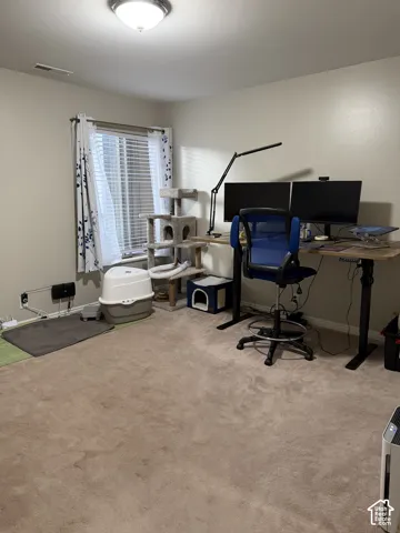 Recessed ceiling light fixture and window with blinds and sheer curtains