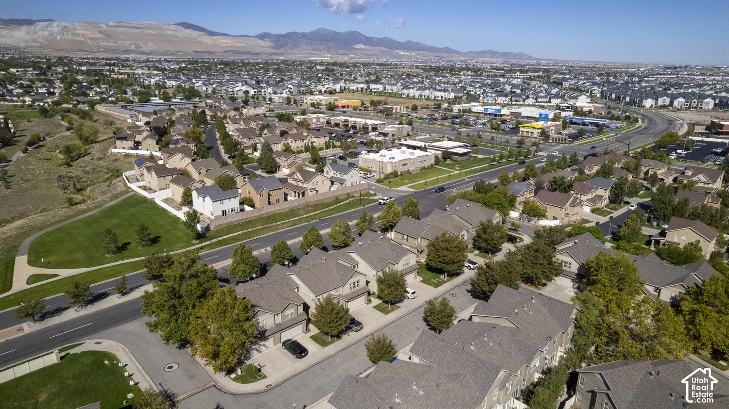 Expansive residential community featuring diverse architectural styles, mature landscaping, and well-maintained roadways