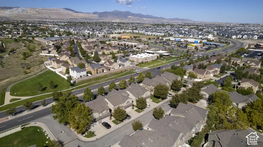 Expansive residential community featuring diverse architectural styles, mature landscaping, and well-maintained roadways